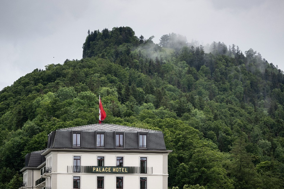 Dark clouds hang over the resort, threatening the ability for the delegations to arrive by helicopter, during the Summit on peace in Ukraine, in Stansstad near Lucerne, Switzerland, Saturday, June 15, 2024. Heads of state from around the world gather on the Buergenstock Resort in central Switzerland for the Summit on Peace in Ukraine, on June 15 and 16. (KEYSTONE/EDA/POOL/Alessandro della Valle)