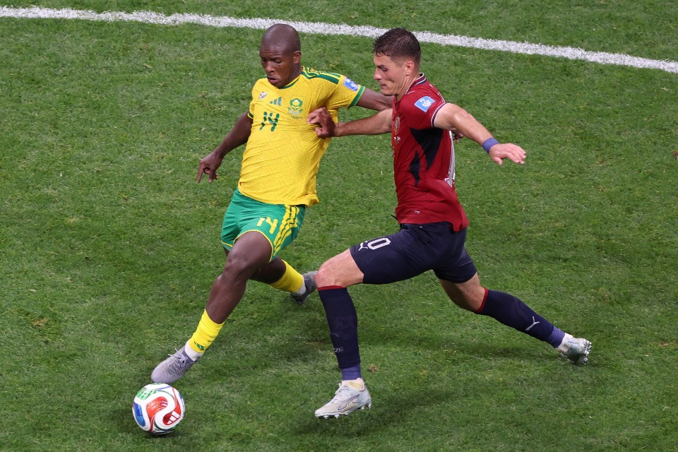 South Africa's Mbekezeli Mbokazi (14) and Czechia's Patrik Schick (10) fight for the ball during the World Cup Group A soccer match between Czechia and South Africa in Atlanta, Thursday, June 18, 2026. (AP Photo/Colin Hubbard)
