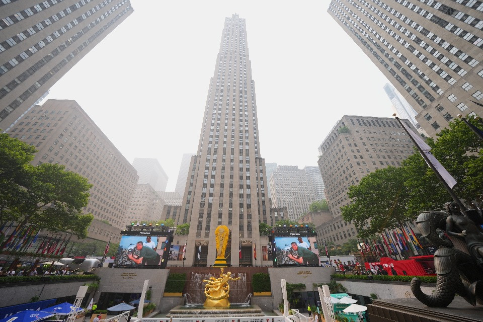 Haze from Canadian wildfire smoke covers the sky above the Rockefeller Center fan village ahead of the Wold Cup soccer tournament's final match between Spain and Argentina, Thursday, July 16, 2026, in New York. (AP Photo/Julio Cortez)